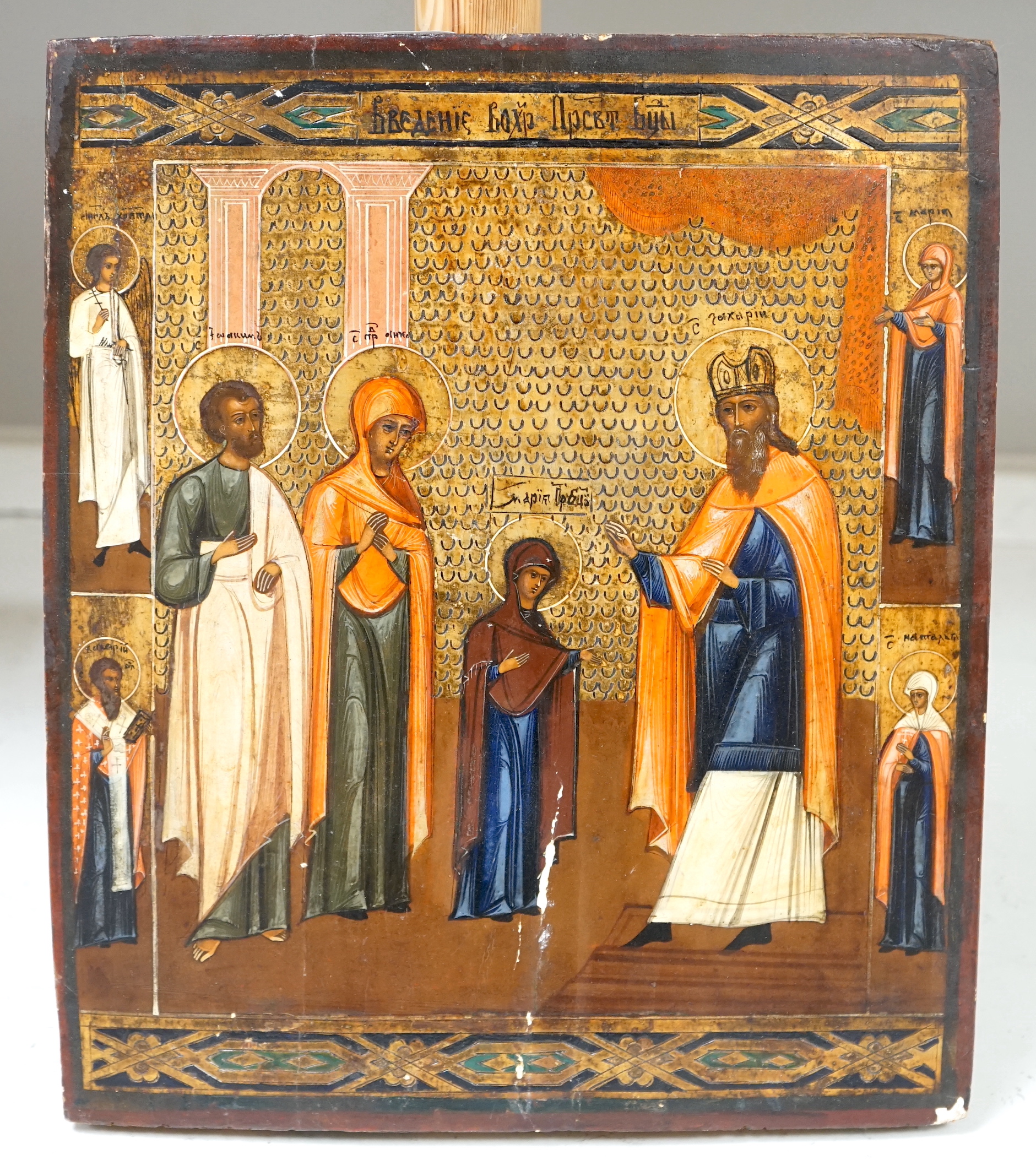 19th century Russian school, Icon, Four saints, pencil inscription and stamp verso, 36 x 31cm